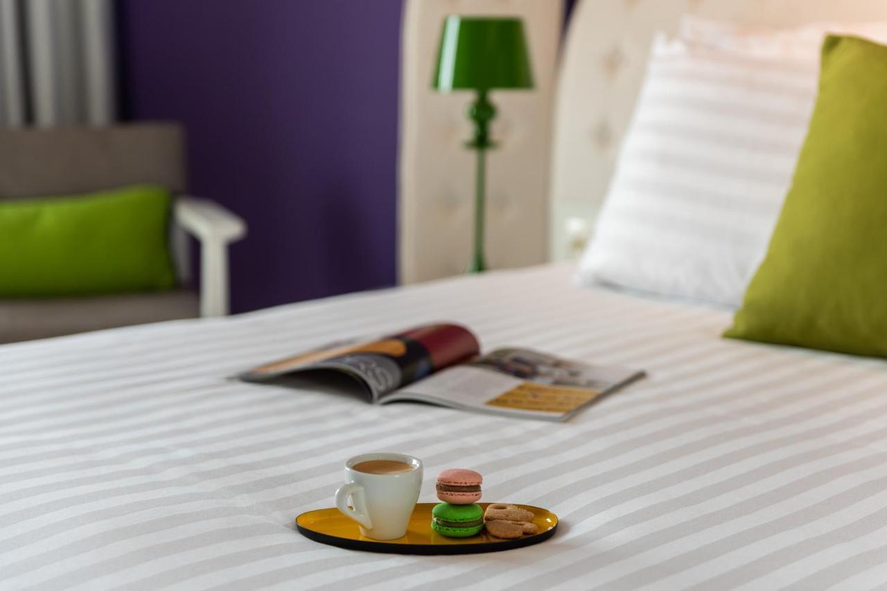 โรงแรมอินดิโก เทลอาวีฟ - ไดมอนด์ ดิสตริก Giv'atayim ภายนอก รูปภาพ A room at the hotel